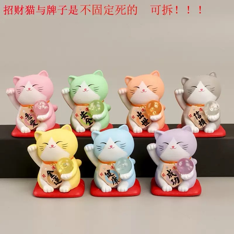 Manekineko con esfera de la vida