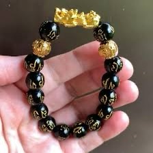 Pulsera Piyao dorada