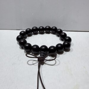 Pulsera de madera negra budista